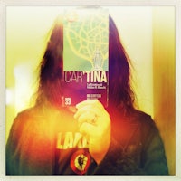 a person holding up a book